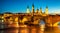 Zaragoza city, Spain, bridge and Cathedral del Pilar at sunset