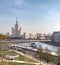 Zaryad Park, Soaring Bridge, Moscow River, ship and skyscraper on Kotelnicheskaya Embankment. Moskvoretskaya embankment.