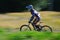 Zawoja, Poland - August 17, 2013. Downhill. Unknown cyclist riding fast on bicycle.