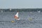Zegrze, Poland - October 4, 2020: Learning to sail on the lake. A small sailboat on the water
