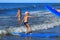 ZELENOGRADSK, KALININGRAD REGION, RUSSIA - JULY 29, 2017: Unknown boy on surfboard resting and learning of surfing.