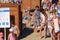 ZELENOGRADSK, KALININGRAD REGION, RUSSIA - JULY 29, 2017: Unknown people standing in queue to dressing-room on a sandy beach.
