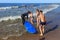 ZELENOGRADSK, KALININGRAD REGION, RUSSIA - JULY 29, 2017: Unknown surfers with surfboards and unknown children.