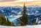 Zell am See at Zeller lake in winter. View from the Mountain Schmittenhohe, snowy slope of ski resort in the Alps