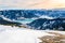 Zell am See at Zeller lake in winter. View from the Mountain Schmittenhohe, snowy slope of ski resort in the Alps