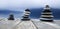 Zen Balancing Pebbles Next to a Misty Lake