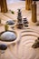 zen garden with balanced stones and sand patterns