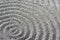 Zen garden circular raked gravel pattern detail