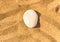 zen meditation stone in sand, concept for purity harmony and spirituality, spa wellness and yoga background