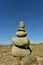 Zen rock stack on Pacific Ocean coast with waves on shore