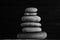 Zen sculpture. Harmony and balance, cairn, poise stones on wooden table