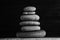 Zen sculpture. Harmony and balance, cairn, poise stones on wooden table