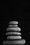 Zen sculpture. Harmony and balance, cairn, poise stones on wooden table