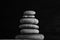 Zen sculpture. Harmony and balance, cairn, poise stones on wooden table