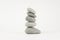 Zen stack of five grey rocks