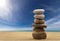 Zen stones balanced on the beach