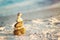 Zen Stones on beach for perfect meditation. Calm zen meditate background with rock pyramid on sand beach symbolizing stability, ha