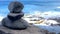Zen stones on a rock near the atlantic ocean