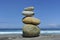 Zen stones stacked at beach copy space