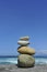 Zen stones stacked at beach copy space