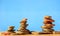 Zen stones stacks on blue background