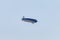 Zeppelin flying in the sky - In summer sky - Denmark