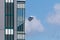 Zeppelin flying in the sky - In summer sky - near building