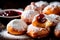 Zeppole - Deep-fried dough balls dusted with powdered sugar, often filled with cream or jam