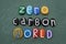 Zero Carbon World, creative environmental issue logo composed with multi colored stone letters