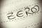 Zero spelled on lined paper