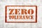 Zero tolerance graffiti on stucco wall