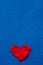 Zero waste concept. environmentally friendly flax heart on a blue background. Congratulations on Valentine`s Day, birthday or