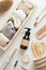 Zero waste eco-friendly accessories set. Flat lay amber glass dropper bottle, eco bags, wooden toohbrushes, hair comb. Flat lay,