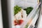 Zero waste grocery in fridge. Fresh vegetables in opened drawer in refrigerator. Plastic free carrots,tomatoes, mushrooms,radish,