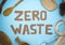 Zero waste inscription on a blue background. Environmental movement to reduce plastic waste