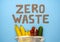 Zero waste inscription on a blue background. Environmental movement to reduce plastic waste