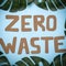 Zero waste inscription on a blue background. Environmental movement to reduce plastic waste