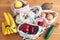 Zero Waste shopping concept. Fresh vegetables in eco cotton bags on wooden table. Pepper, beets, tomatoes, cucumber, bananas,