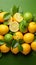 Zesty display Fresh lemons and oranges arranged on vibrant green