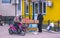 Zhytomyr, Ukraine - January 19, 2016: Seller suggests to buy ripe fruits.