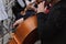 Zhytomyr, Ukraine - May 15, 2021: man street musician playing cello classical music