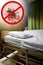 Zika virus. Clean empty sickbed in a hospital ward with stop mos