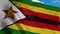 Zimbabwe flag on a flagpole waving in the wind, blue sky background. 4K