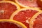 Zingy grapefruit slices, close-up of refreshing citrus segments