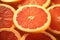 Zingy grapefruit slices, close-up of refreshing citrus segments