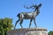 Znamensk, Russia. A sculpture of a deer, the Velau symbol, against the background of the sky