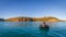 A Zodiac approaches an expedition cruise ship in Prince Frederick Harbor in the remote North West Kimberley coast of Australia