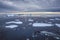 Zodiac boat swimming through arctic sea