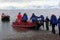 Zodiac boats ferry passengers to shore during a Christmas cruise