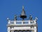 Zodiac clock. Clock Tower with winged lion and two moors striking the bell - early Renaissance 1497 building in Venice, located